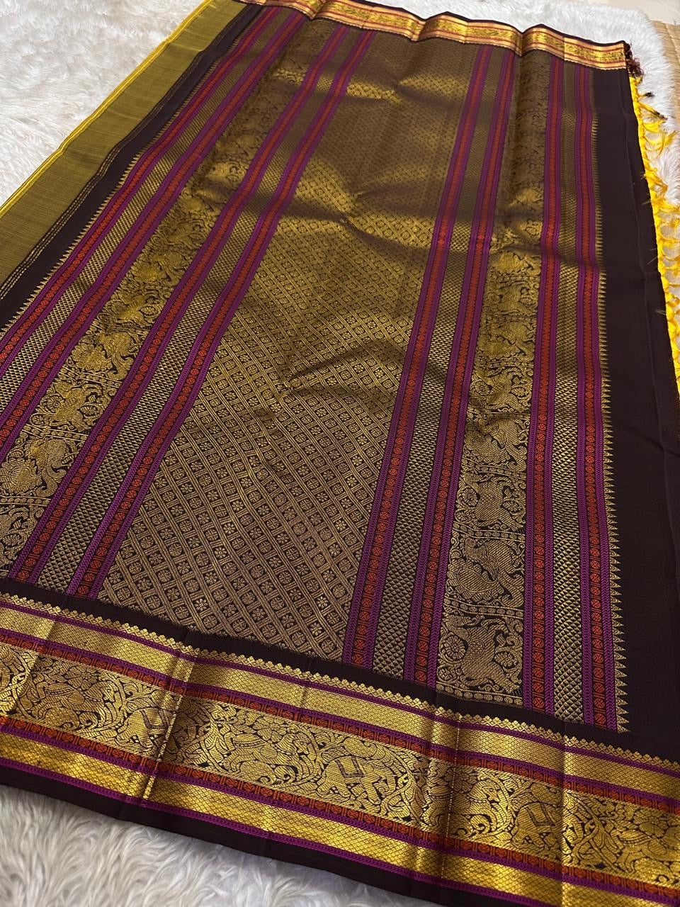 ✨ ✨ Mangalarupa — Pure Silk Kanchipuram Saree ✨
Haldi yellow with gold buttas, aubergine–magenta korvai borders & yaali zari pallu.
Silk Mark Certified ✅ • Free Shipping within USA 🇺🇸 • Ships in 1 Week ✅
