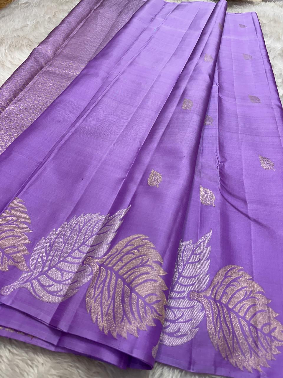 Lavender- Pure silk Kanchipuram handloom saree with contemporary gold and silver Zari leaf motifs on border and Pallu