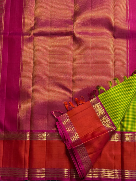 Ilai Pachai & Vermilion Korvai Pure Silk Kanchipuram Saree
Parrot-green kasa kasa kattam checks with vermilion borders & rani-pink pallu
Silk Mark Certified • Ships in two weeks • Free Shipping within USA