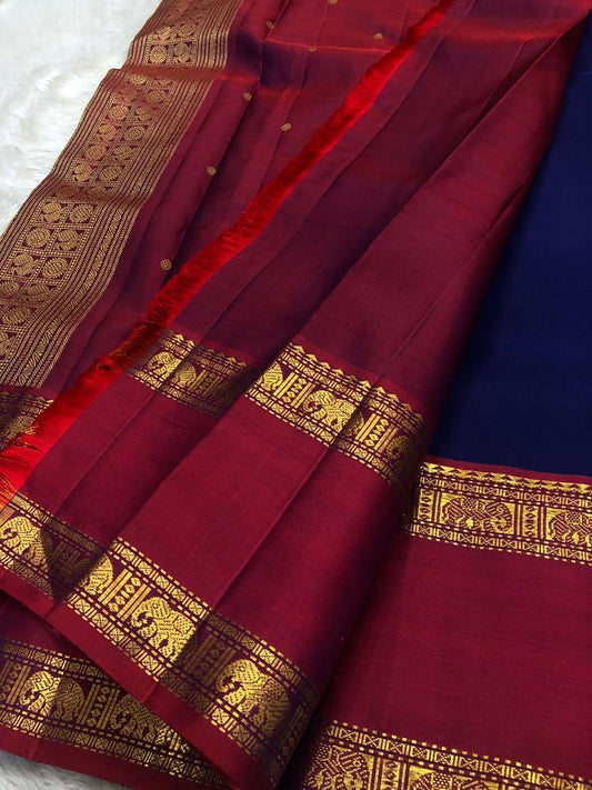 ✨ Gandaberunda Neela Varnam — Pure Silk Kanchipuram Saree ✨
Royal navy body with gold elephant & Gandaberunda motifs, rich araku-maroon korvai borders, and temple zari pallu.
Silk Mark Certified ✅ • Fall & Pico Done ✅ • Blouse Stitching Available ($30) ✅