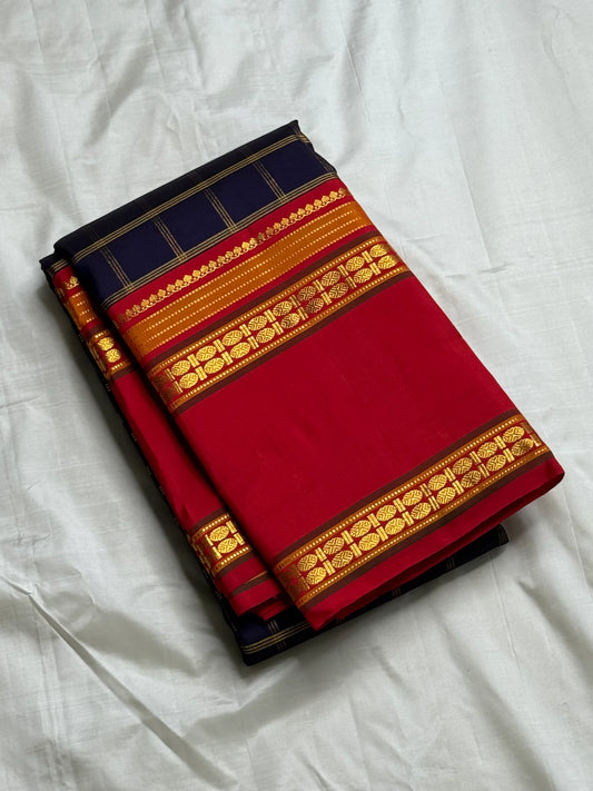 Rani Maragatham Zari Kattam — Pure Silk Kanchipuram (Handloom)
Purple body with fine gold kattam checks & zari lines • Vibrant vermillion red border with temple coin motifs
Rich red pallu with antique-gold zari panels • Silk Mark Certified ✅