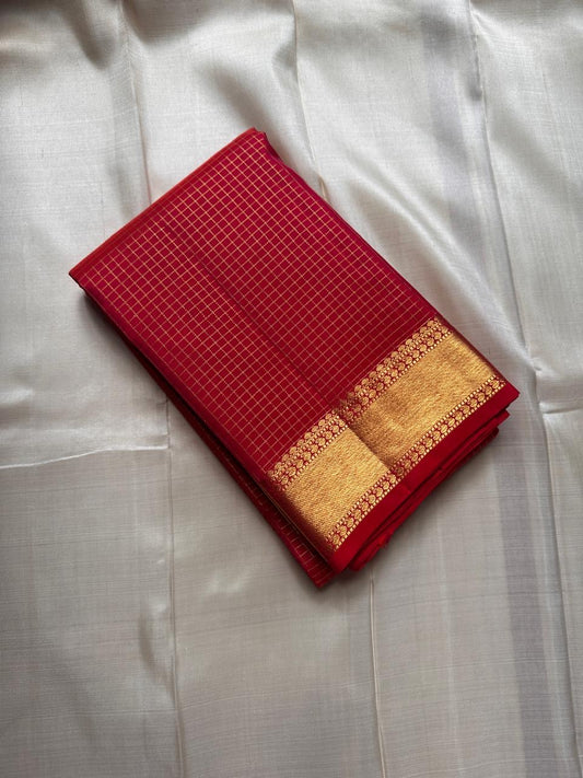 Madhuvanam Vermillion Red – Pure Silk Kanchipuram Saree
Rich vermillion red kattam checks with lustrous gold zari borders and brocaded pallu ✨
Silk Mark Certified • Ships in Two Weeks • Free Shipping within USA 🎁