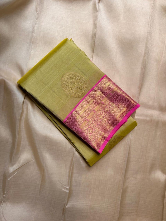 Lotus Lime Kanchipuram silk saree with lime-green body, rani pink korvai border, and grand zari brocade pallu. Silk Mark Certified. Free USA Shipping. Ships in two weeks.