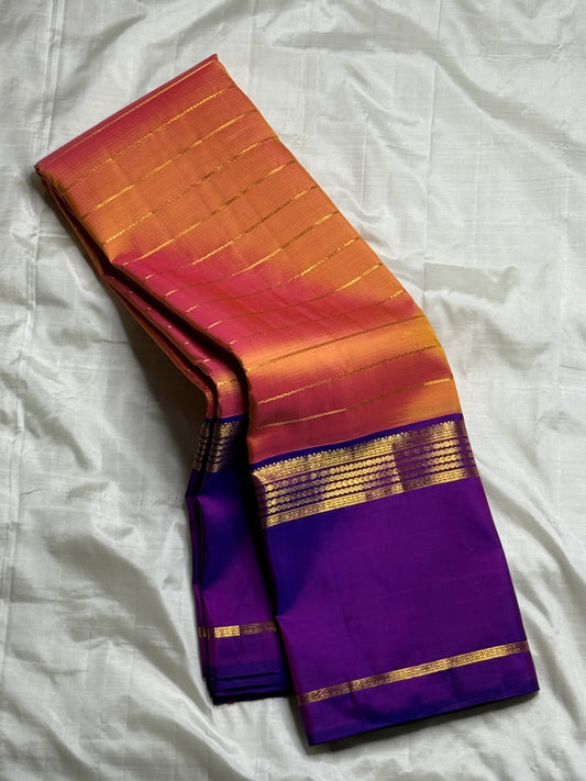 Sunset Veldhari — Pure Silk Kanchipuram Saree
Apricot-orange body with gold zari varisai lines and deep violet korvai borders ✨
Silk Mark Certified ✅ • Ships in 1 Week ✅ • Free Shipping within USA 🇺🇸