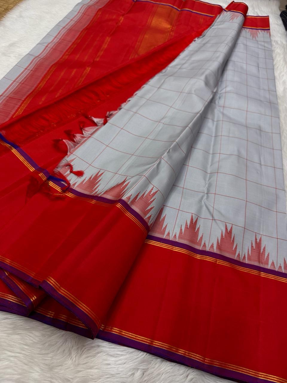 Tazhampoo 🌸 – Blue Kanchipuram Pure Silk Saree
Thazampoo Reku in Bright Orange-Red Border
Purple Selvedge for Vibrant Contrast
Handwoven in Our Family Village, Kanchipuram
Silk Mark Certified | Blouse fabric Included |stitching Available