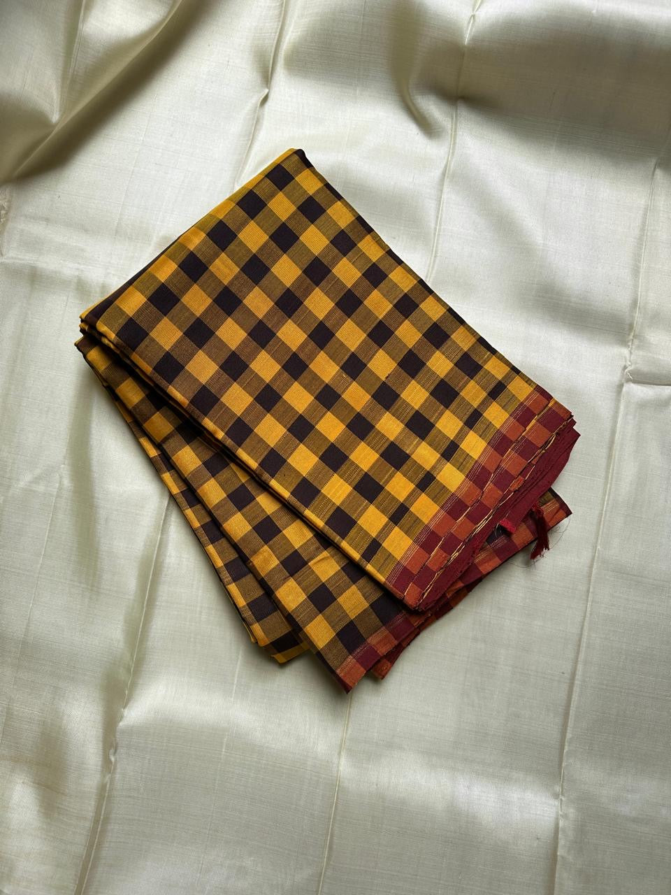 Kanchi kattam mustard and brown checked saree with deep maroon Pallu, Kai korvai