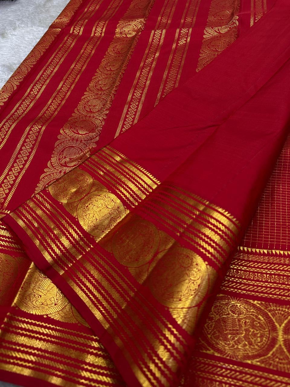 Vermilion Podi Kattam 🌺 Pure Silk Kanchipuram Saree
All-over zari pinstripes & mini podi kattam checks ✨
Broad antique-gold borders with chakram medallions 🪙
Silk Mark Certified ✅ | F