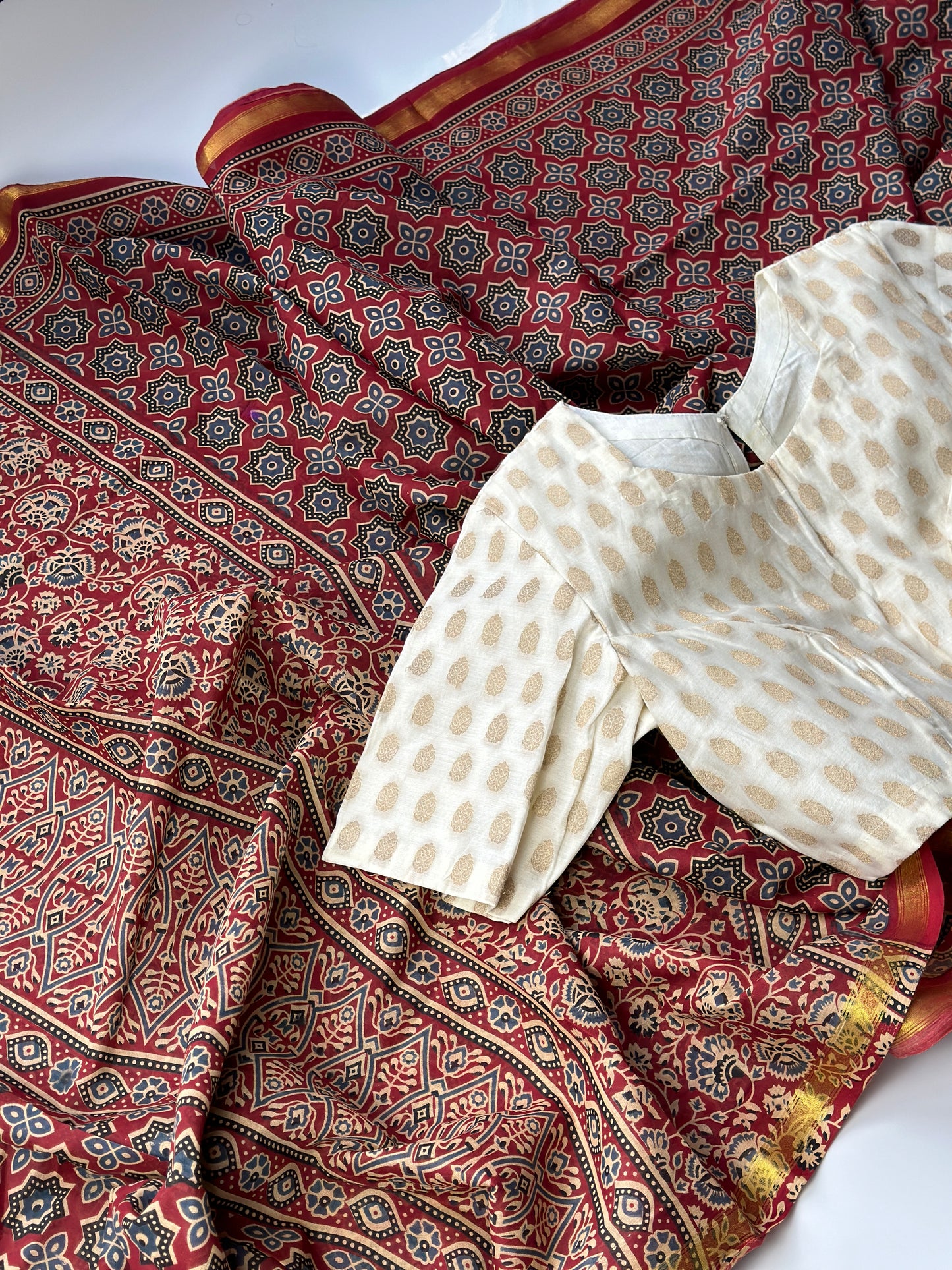 Ajrakh saree with maheshwari border & banarasi silk cotton blouse set