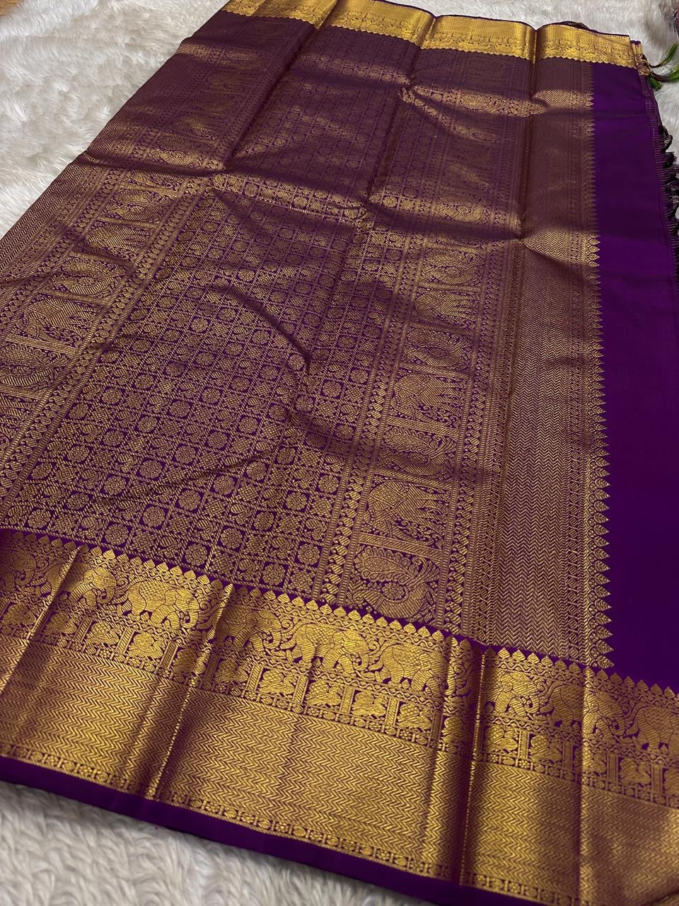Subha Kattam — Pure Silk Kanchipuram Saree
Vadamalli purple saree with gold buttas & fine kattam checks ✨
Elephant zari borders, grand pallu, Silk Mark Certified ✅ • Free USA Shipping 🇺🇸 • Ships in 2 Weeks 🚚