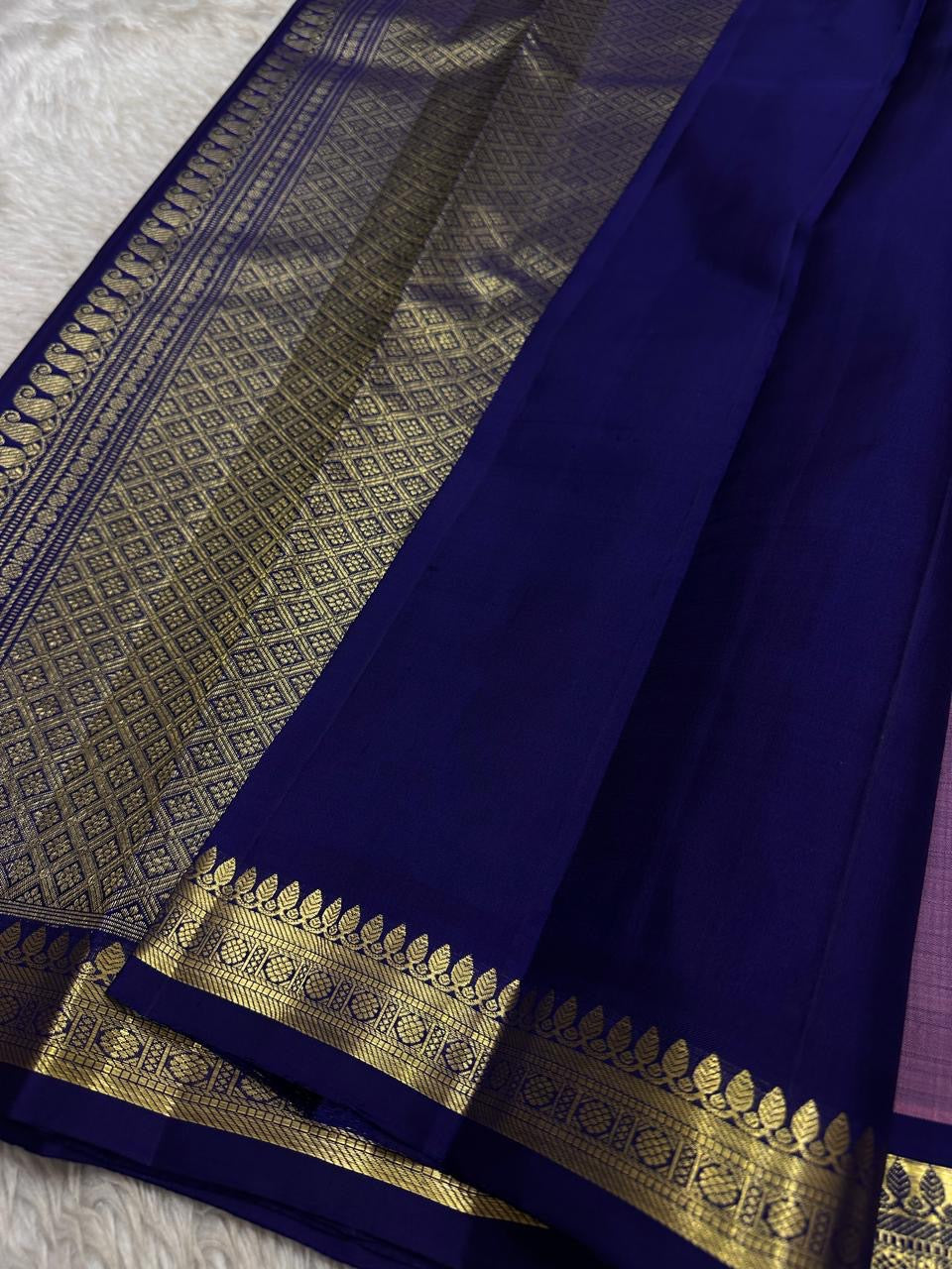 Anuragini: Lilac Mist Pure Silk Kanchipuram Saree with Dainty Gold Buttas
Deep Navy Contrast Temple Borders & grid  Zari  Pallu, Silk Mark Certified ✅
Free Shipping within USA | Ships in Two Weeks 🇺🇸