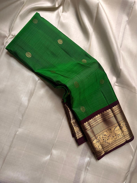 Harita Butta Brown – Pure Silk Kanchipuram
Harita-green body with gold buttas & aubergine-brown zari border
Silk Mark Certified • Free USA Shipping • Ships in Two Weeks