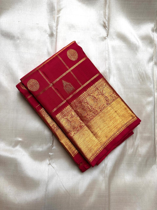 Leelavati Kattam Red
Kumkum-Red Kanchipuram Silk Saree
Zari Kattam Checks & Elephant Procession Border