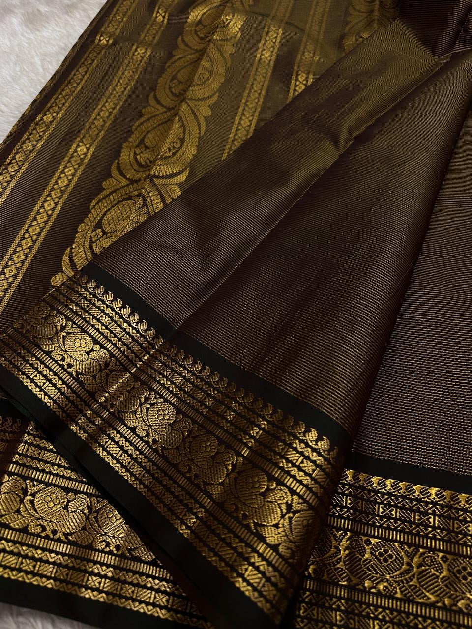 Shyama Kamalam—espresso-black Kanchipuram silk with vairaoosi stripes, lotus buttas, peacock-brocade borders & rich brocade pallu. Silk Mark. Free USA shipping.