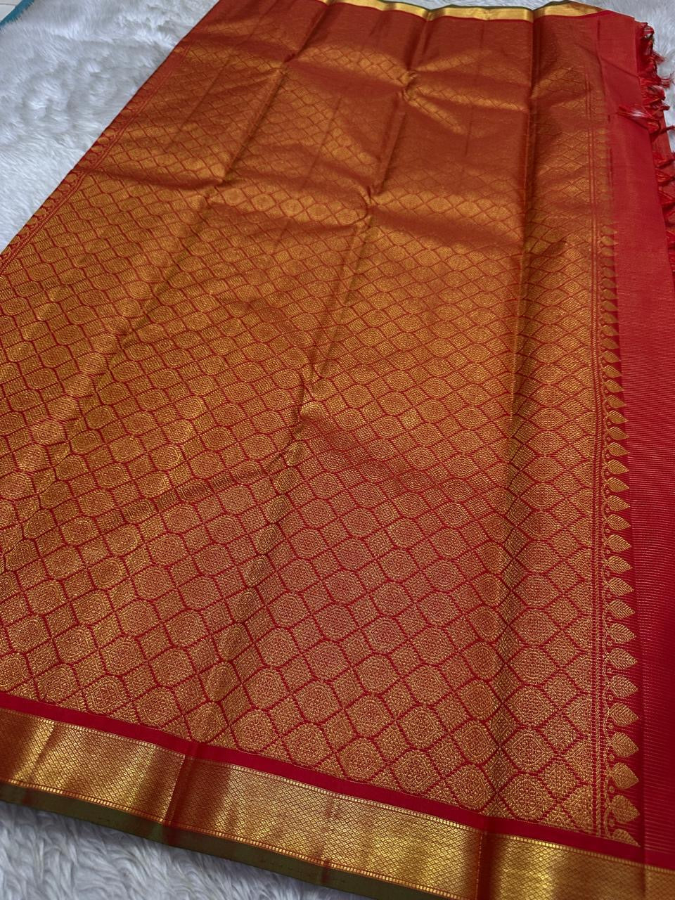 Red Glimmering Deer Vairaoosi — Pure Silk Kanchipuram Saree
Kumkum red vairaoosi with antique-gold deer buttas & kaddi zari border.
Silk Mark Certified · Free USA Shipping · Ships in 2 Weeks ✨