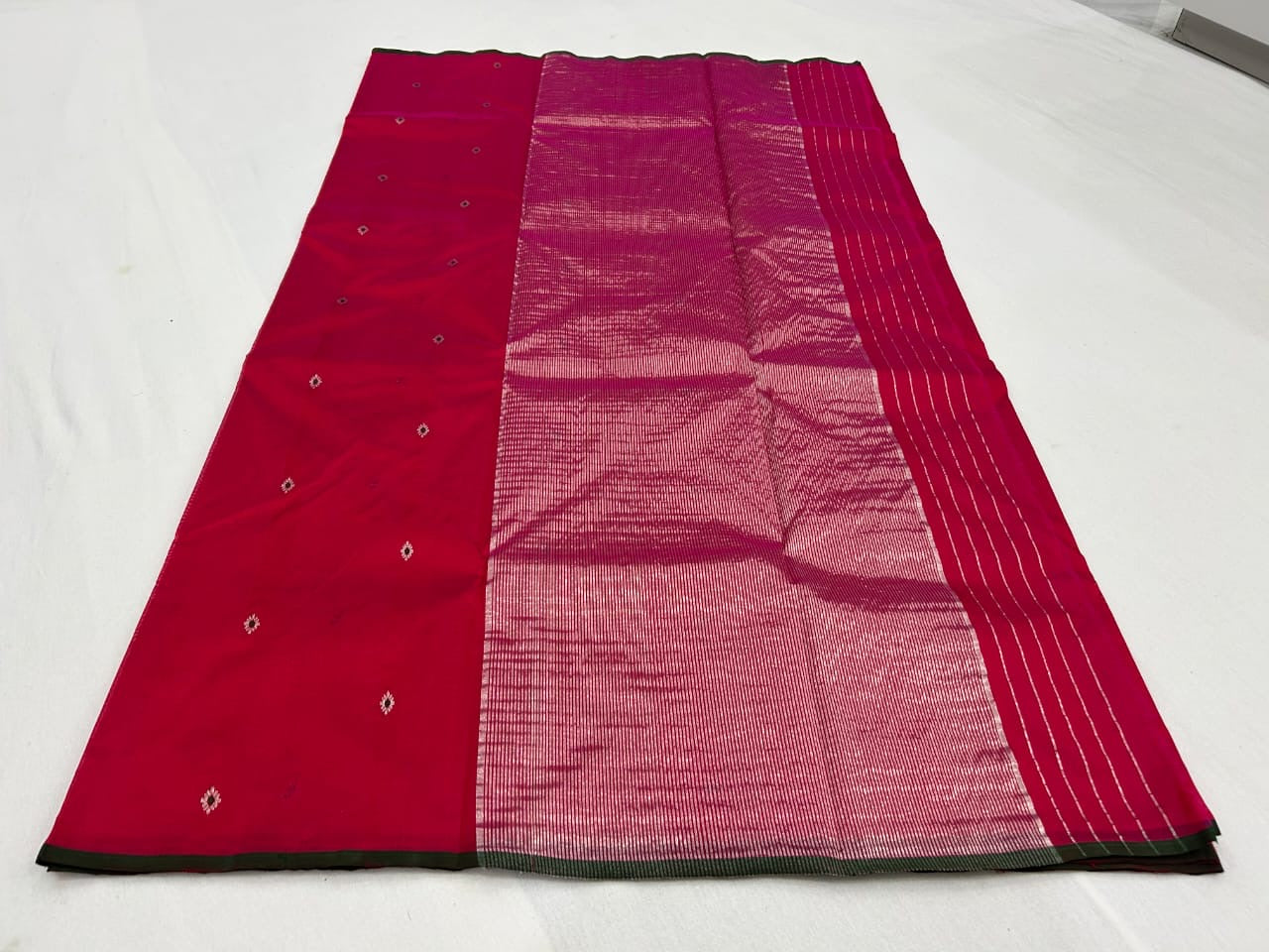 Pure tissue silk handloom chanderi tomato red with a green Mina with zari butta all over