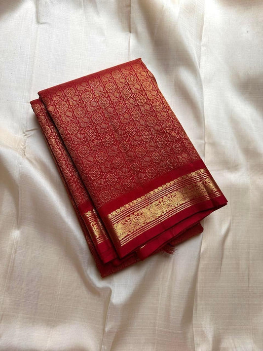 Ratna Rekha — Pure Silk Kanchipuram Saree
Deep kumkum red body with gold coin buttas, rich woven zari jaal pallu, and antique-gold floral borders.
Silk Mark Certified • Blouse Stitching ($30) • Free USA Shipping • Ships in 1 Week