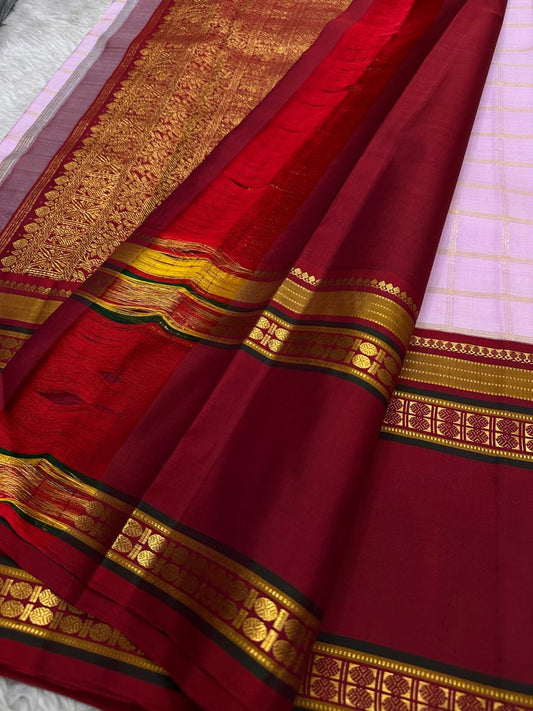 Pastel Pink Zari Kattam
Blush-pink Kanchipuram Silk Saree
Contrast Maroon Borders in Gold Zari