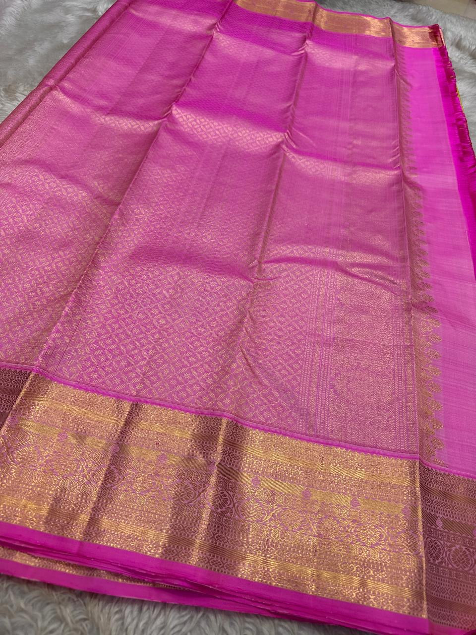Lotus Lime Kanchipuram silk saree with lime-green body, rani pink korvai border, and grand zari brocade pallu. Silk Mark Certified. Free USA Shipping. Ships in two weeks.