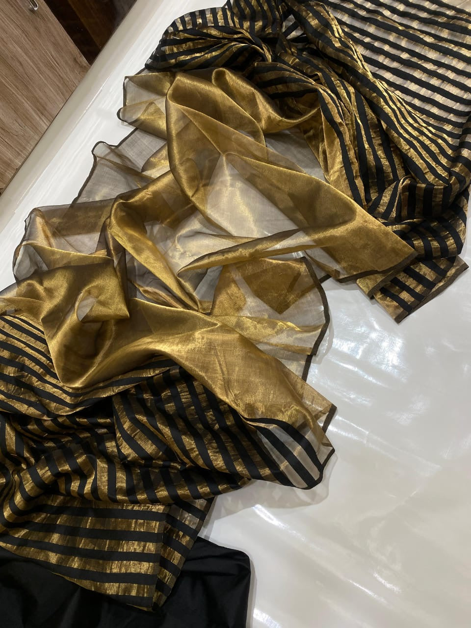 Black chanderi beauty adorned with gold zari pure chanderi tissue silk saree