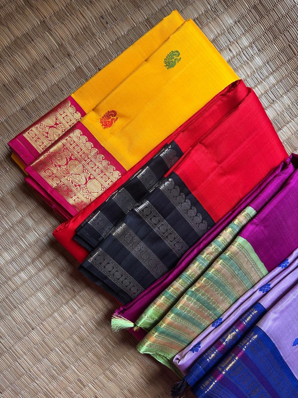 Kohl & Crimson Silk — Pure Kanchipuram Saree
Crimson body with kohl-black silver-zari borders & grand silver pallu
Silk Mark Certified • Free Shipping within USA • Ships in Two Weeks