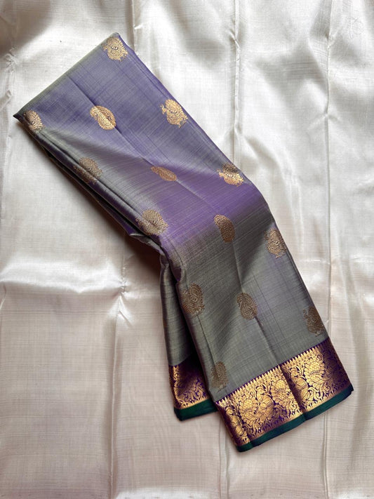 Smoky Lavender
Pure Kanchipuram Handloom Silk Saree
Gold Peacock Zari • Korvai Grandeur