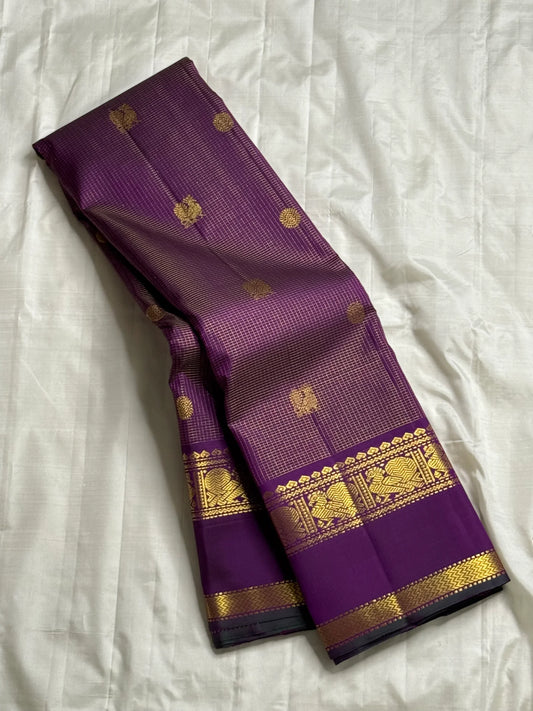 Kalika Purple — Pure Silk Kanchipuram Saree
Royal Purple with Gold Coin & Kalika Paisley Zari Buttas | Annapakshi Panel Border | Brocade Pallu
**Silk Mark Certified ✅ •ships in 2 weeks