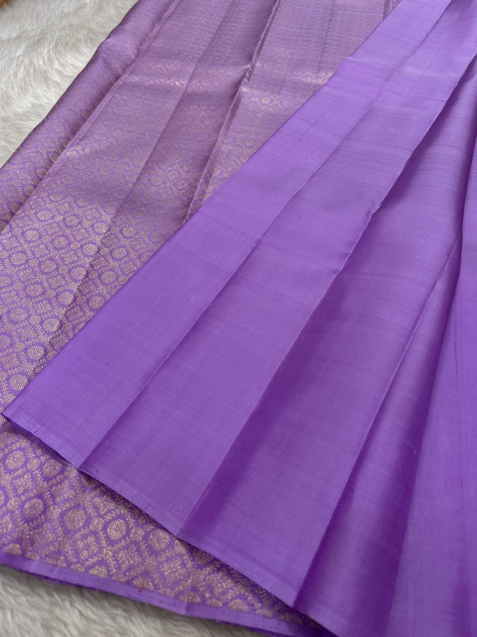 Lavender- Pure silk Kanchipuram handloom saree with contemporary gold and silver Zari leaf motifs on border and Pallu