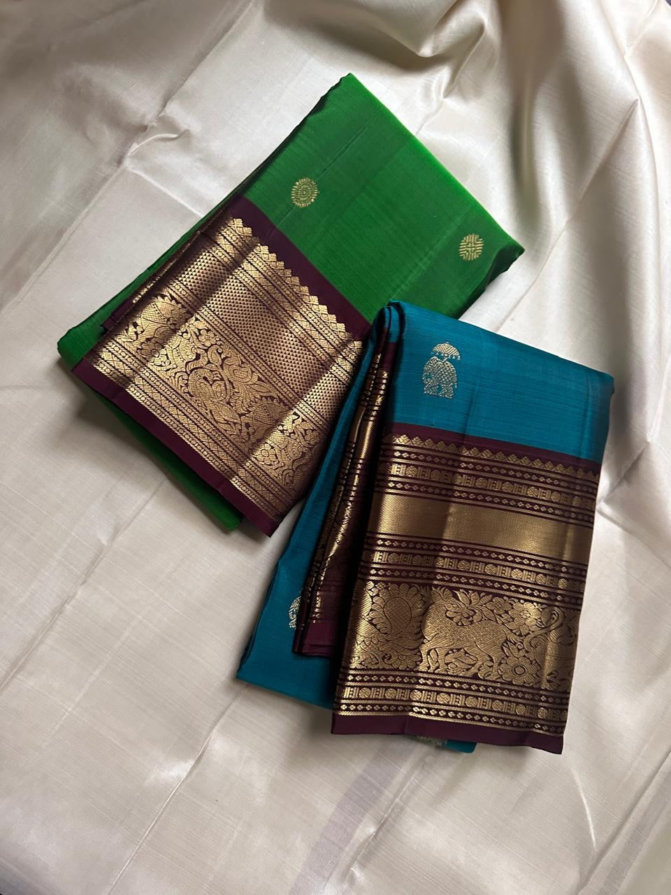 Harita Butta Brown – Pure Silk Kanchipuram
Harita-green body with gold buttas & aubergine-brown zari border
Silk Mark Certified • Free USA Shipping • Ships in Two Weeks