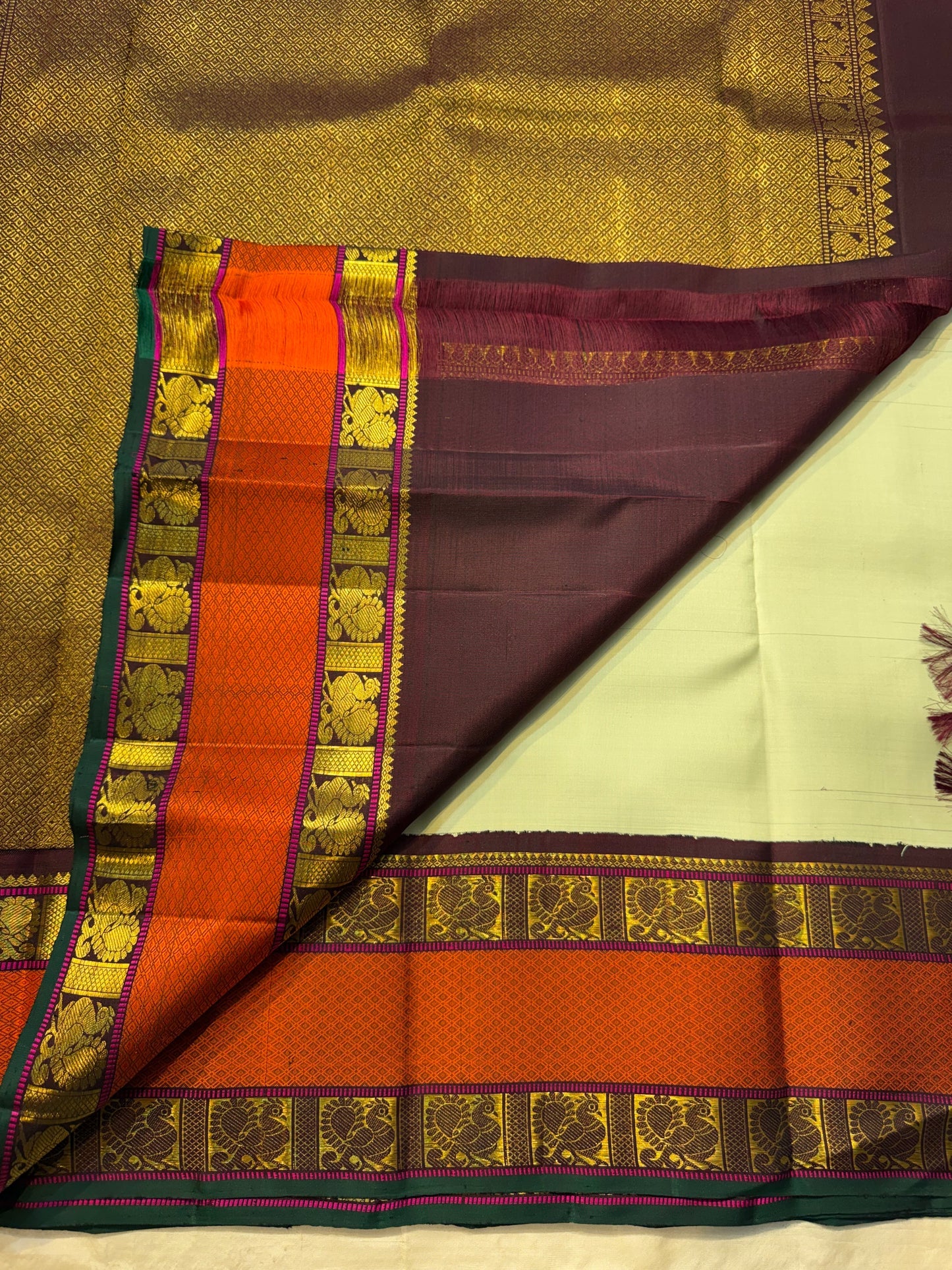 Pure Kanjivaram Silk Saree • Rettapet Yaanai Border • Pistachio Green with Rust Orange