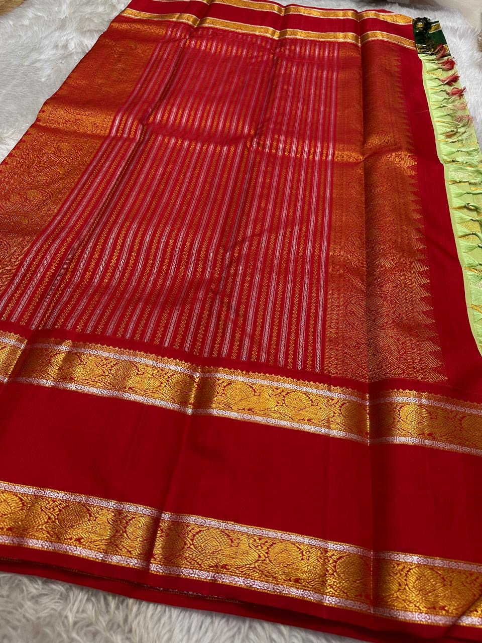 Pistachio Ganga Jamuna – Pure Kanchipuram Silk Saree
pistachio green body with zari kattam & floral buttas ✨
Ganga Jamuna borders in emerald green & vermilion red 🌿🔥
vermilion red pallu richly woven with zari, Silk Mark Certified, delivery in 2 weeks