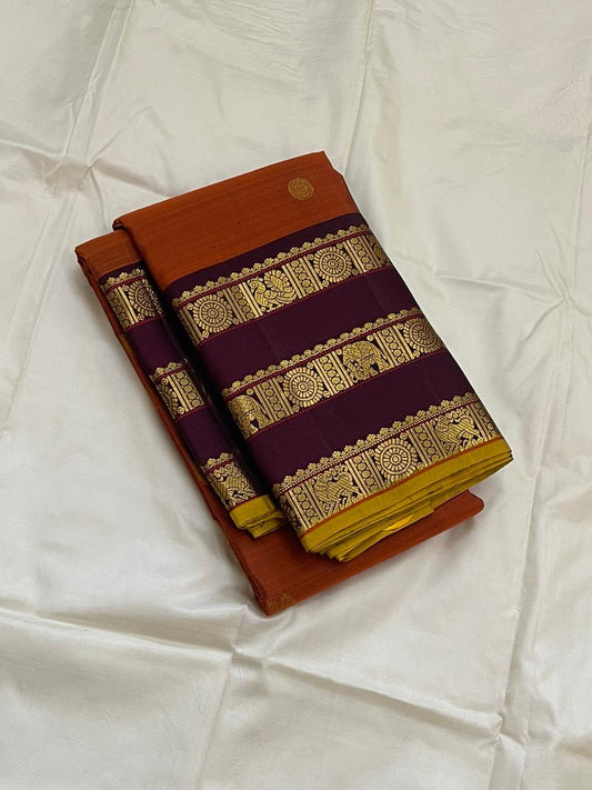 Rust Orange Varisaipet Mayil Chakram – Korvai Kanchipuram Silk Saree
Rust-orange body with gold chakram & peacock buttas
Vadamalli korvai border with varisaipet stripes & elephant motifs
Rich zari-brocade pallu | Contrast vadamalli blouse | silk mark