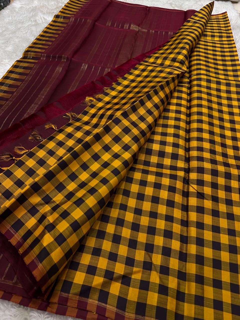 Kanchi kattam mustard and brown checked saree with deep maroon Pallu, Kai korvai