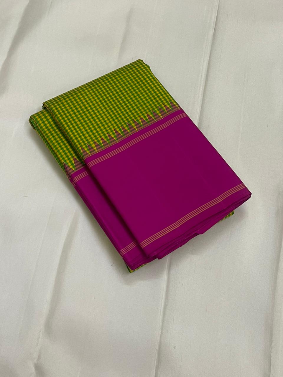 Rose Garden | Korvai Kanchipuram Pure Silk Saree
Magenta-rose body with parrot green micro-checks & temple Korvai join
Rettai pettu striped zari pallu | Contrast magenta blouse
Silk Mark Certified | Dry clean only
Ships in 1 week | Free Shipping USA