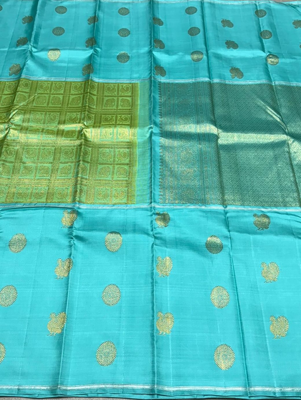 Aaral – Ice Blue & Spring Green Mubbagam Kanchipuram Pure Silk Saree with Mayil Chakram Buttas & Vanasringaram Grid Pallu