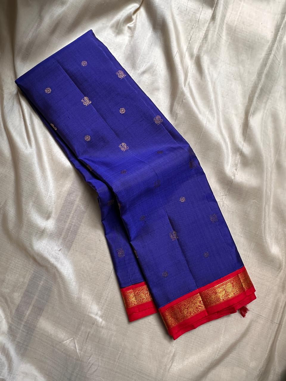 Pure silk Zari kattam butta pink and red saree with peacock, kamalam and kolam motifs
