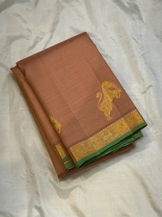 Tamra Yazhi — Pure Kanchipuram Silk vairaoosi with Antique Gold zari Yazhi Motifs
green-edged traditional brocade border
Silk Mark Certified • Free Shipping within USA • Ships in Two Weeks