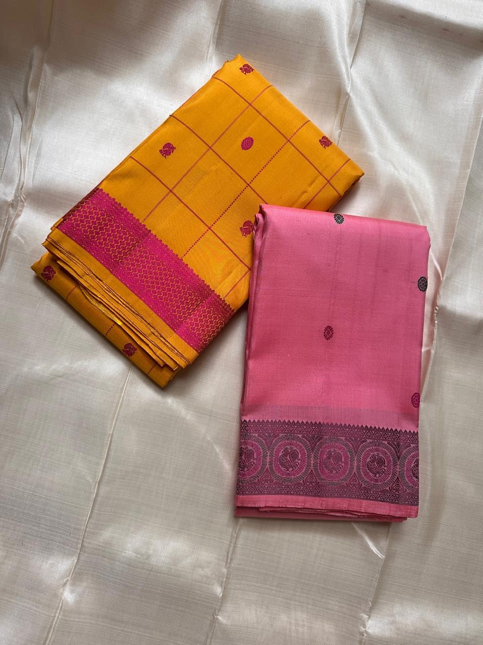 Marigold Pink Silk Thread — Pure Kanchipuram Silk
All-thread weave in marigold yellow with magenta kattam checks & buttas
Pink–orange zari woven pallu • Silk Mark Certified • Free Shipping USA