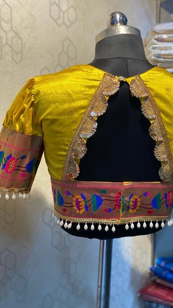 Yellow Paithani semi silk blouse front view with traditional woven border