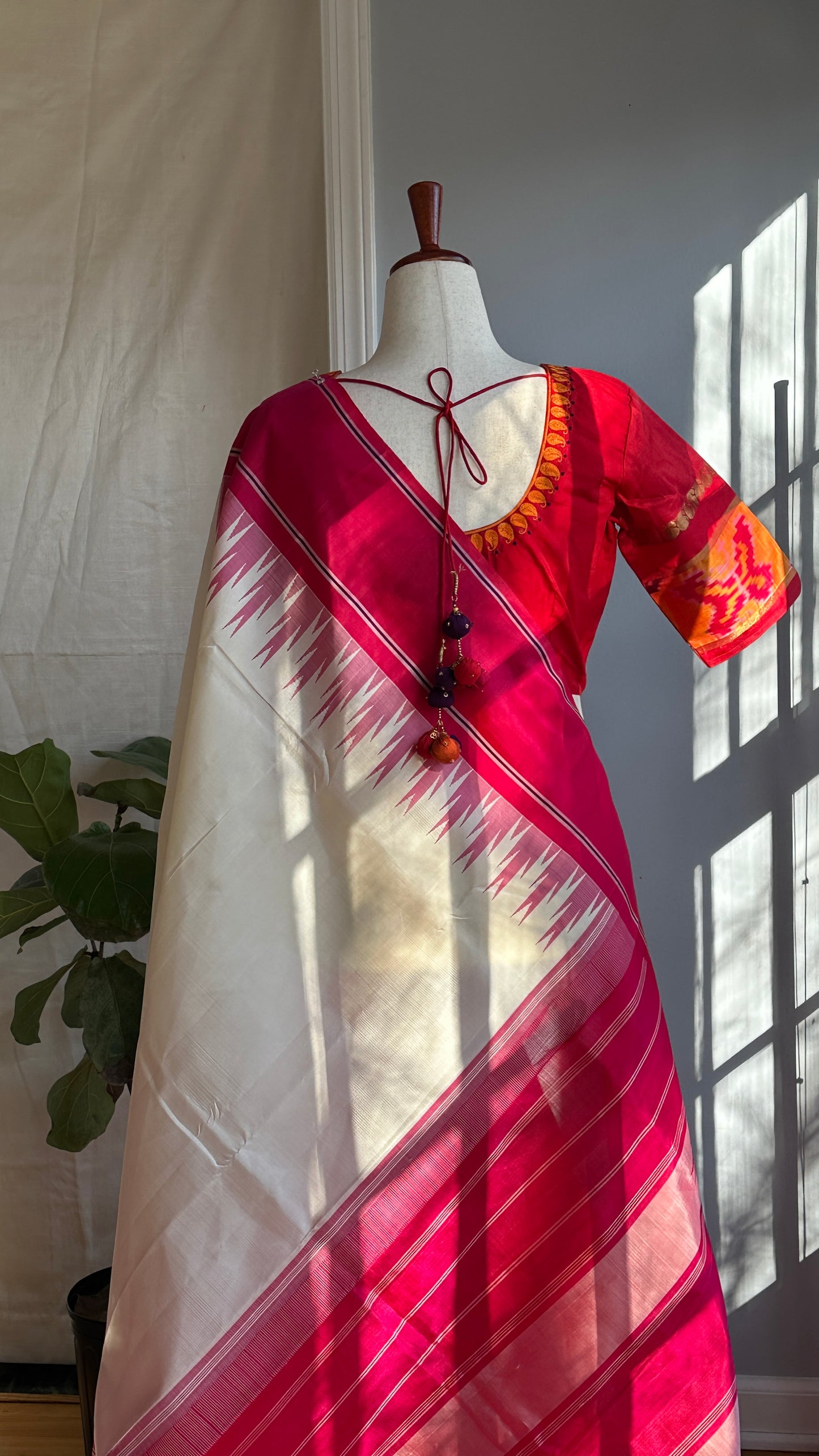 "shree" collection - pure silk embroidery blouse with chosen motifs in ikat silk orange red and purple