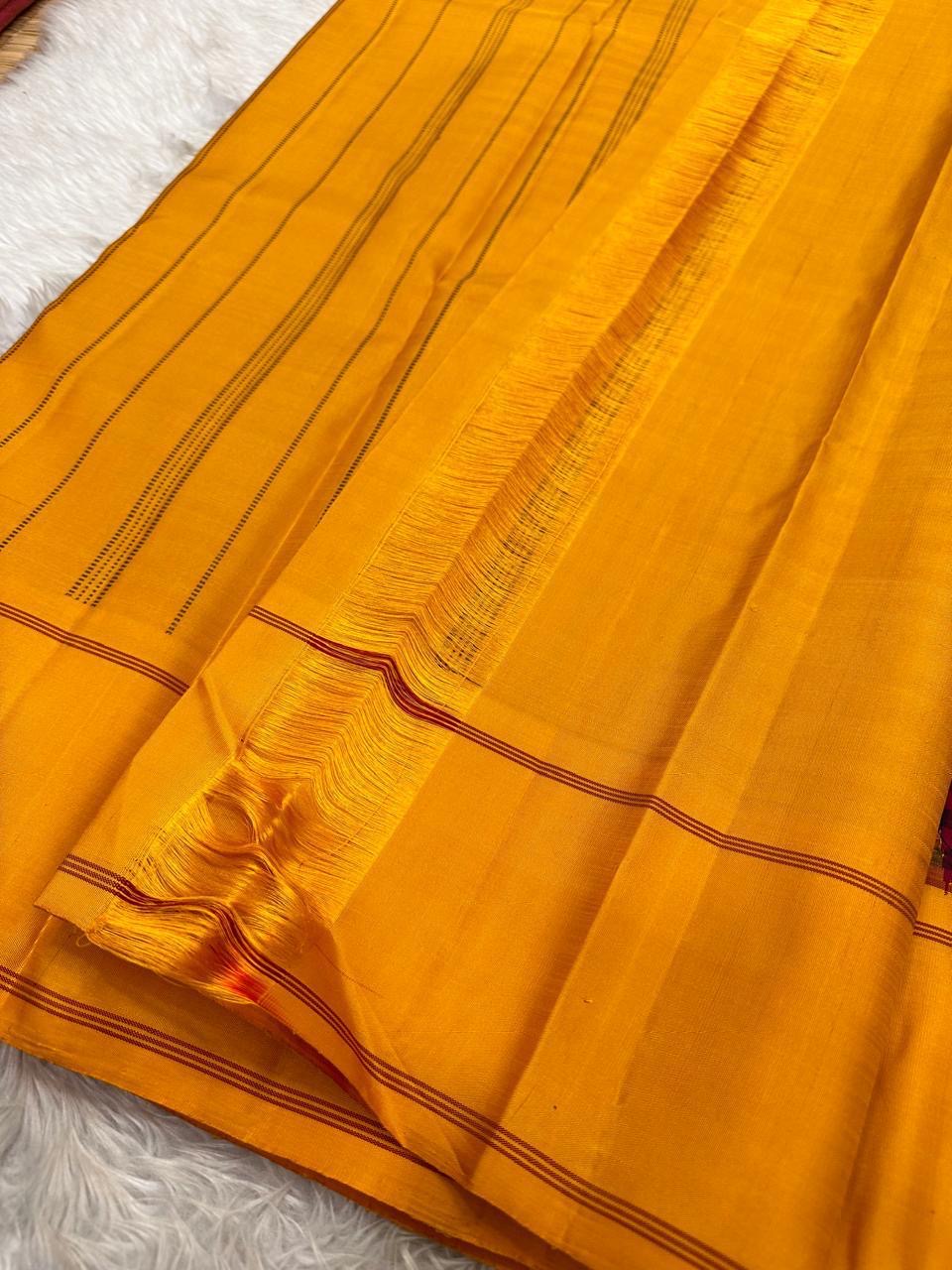 Paavai – Arakku Red & Brown Pattani Kattam Kanchipuram Pure Silk Saree with Mustard Border & Pillayar Moggu Motifs