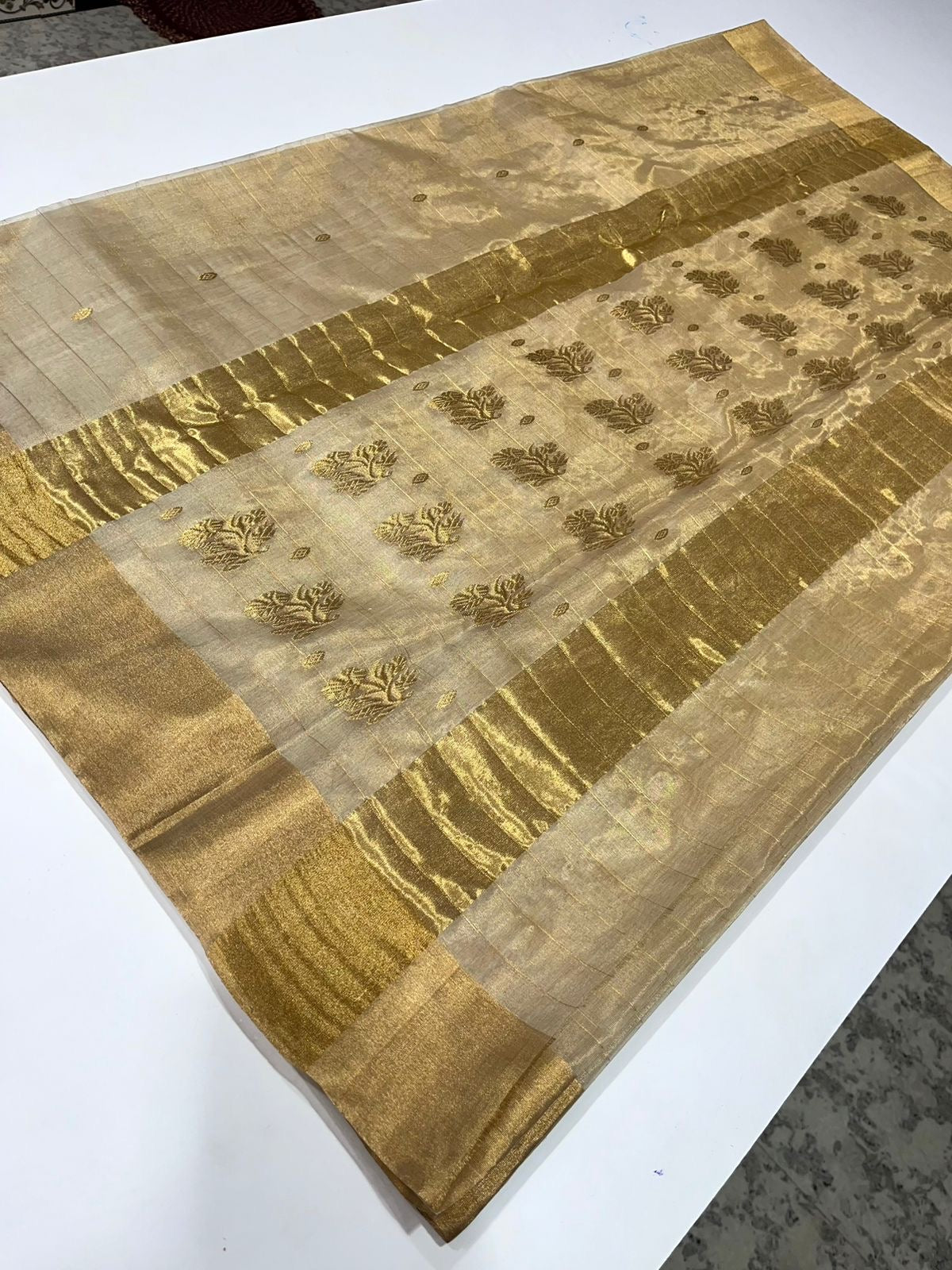 ✨ Pure Silk Chanderi Saree: Swarna Rekha (Champagne Gold Whisper)
Handwoven in luminous champagne-gold with zari buttas and pin-check texture ✨
Silk Mark Certified • Blouse Stitching Available ($30) • Free Shipping within USA • Ships in Two Weeks