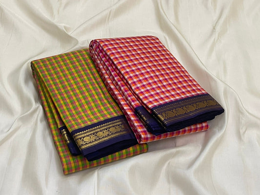 Rani Kanthi — Pure Silk Kanchipuram Saree
Sunset-orange, rani-pink & haldi-yellow kattam checks ✨
Navy korvai borders with intricate gold zari vines
Rich navy pallu with zari pinstripes & tasseled finish
Silk Mark Certified • Free USA Shipping in 1 week