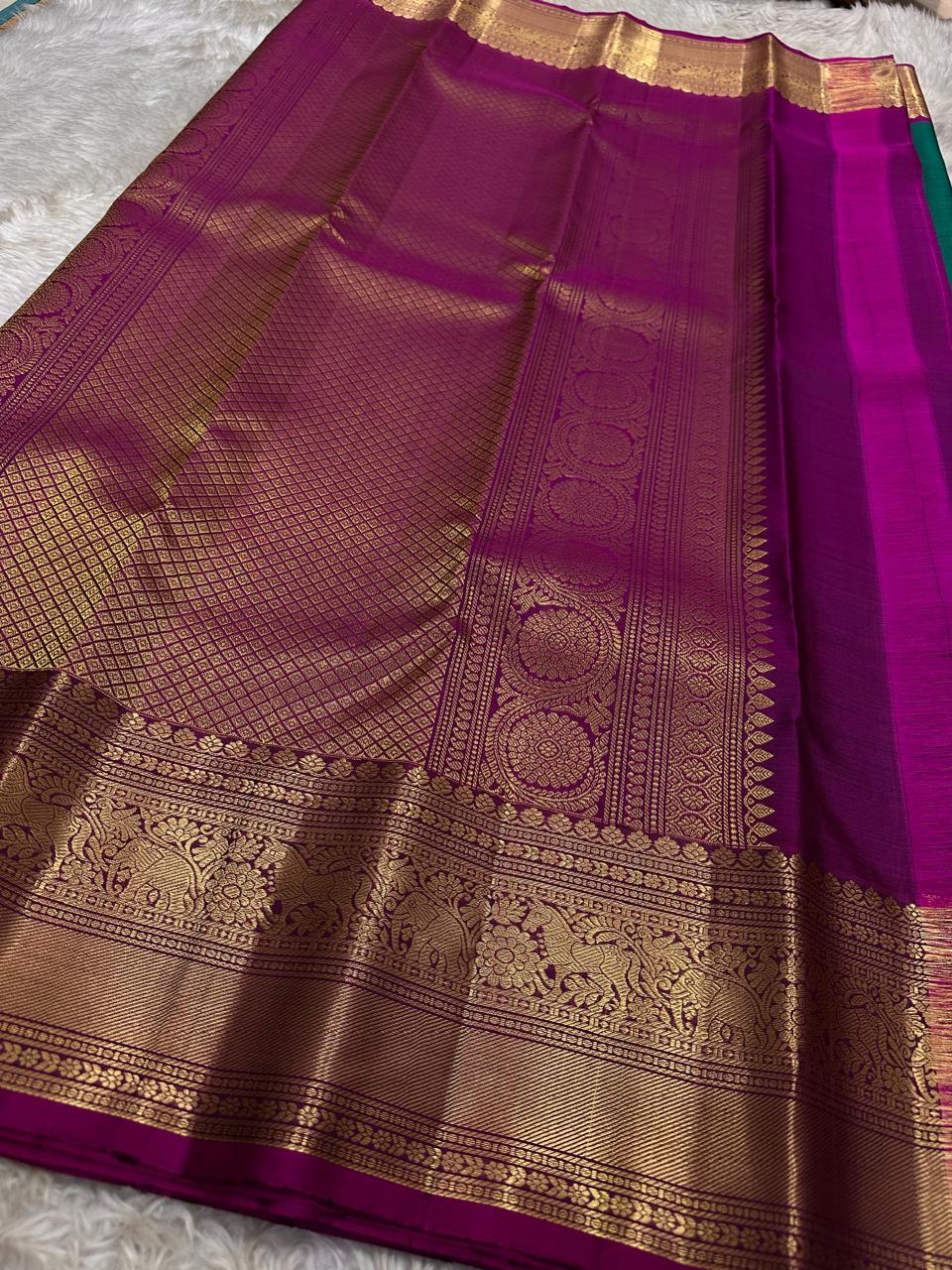 Peacock Green Pushpam – Pure Silk Kanchipuram Saree
 floral butta body with magenta contrast floral zari border
Grand woven zari pallu with traditional medallions & motifs
Silk Mark Certified | Free Shipping within USA
Ships in 1 Week | Fall & Pico