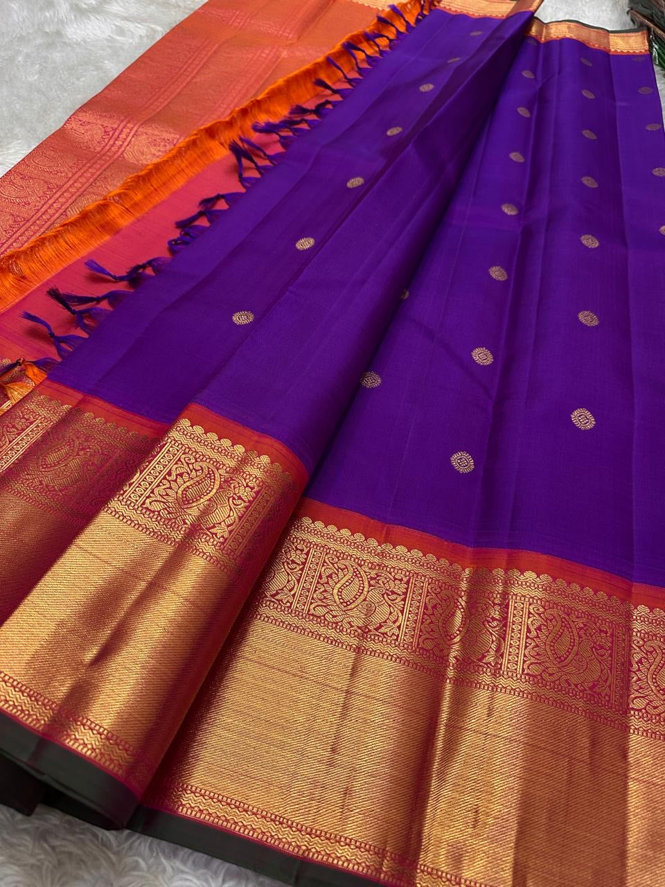 Mayuri -Purple Coral Pure Silk Kanchipuram Saree with Kamalam Buttas, Red-Orange Mayil Border & Exquisite Vanasringaram Zari Pallu