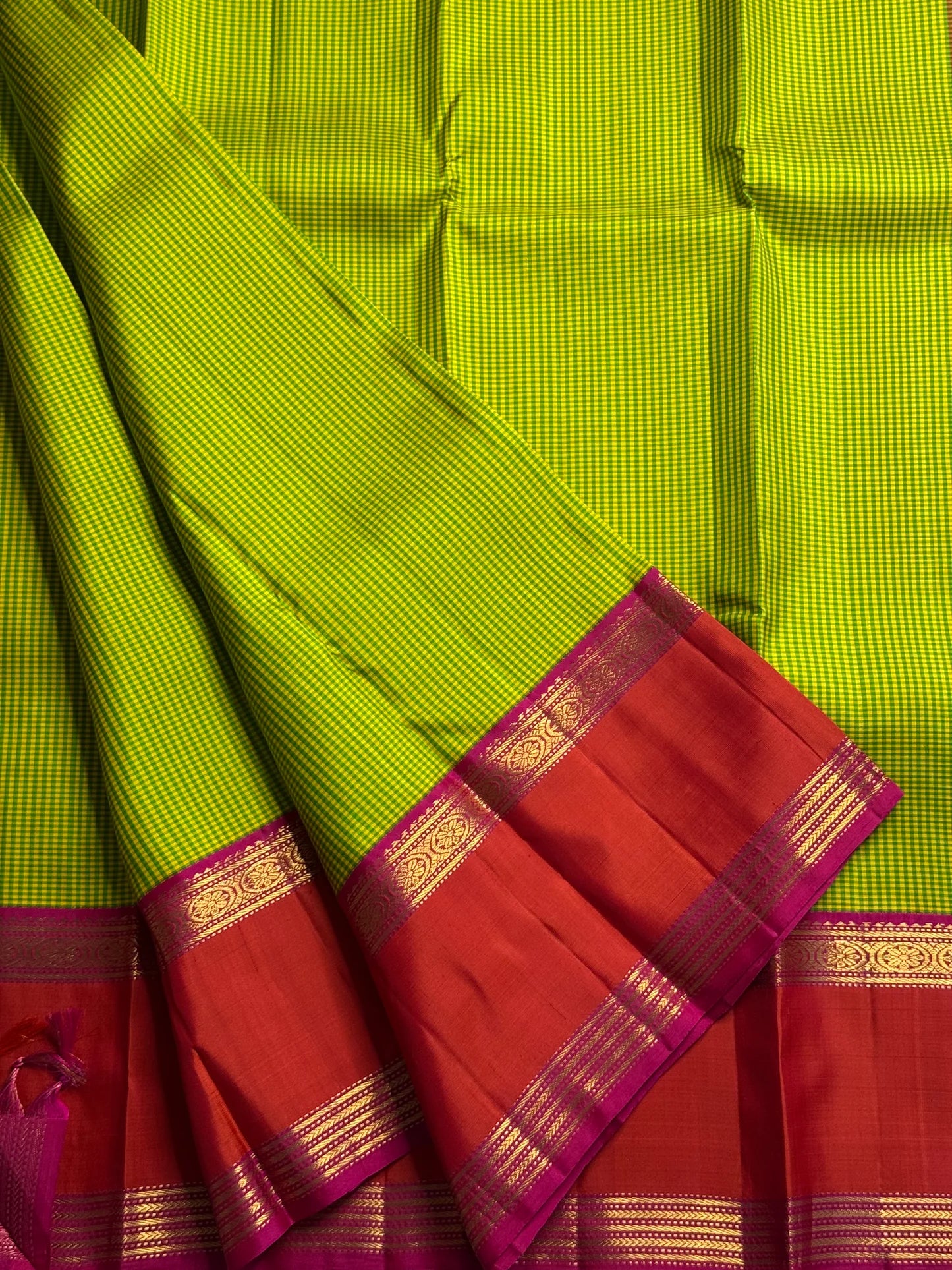 Ilai Pachai & Vermilion Korvai Pure Silk Kanchipuram Saree
Parrot-green kasa kasa kattam checks with vermilion borders & rani-pink pallu
Silk Mark Certified • Ships in two weeks • Free Shipping within USA