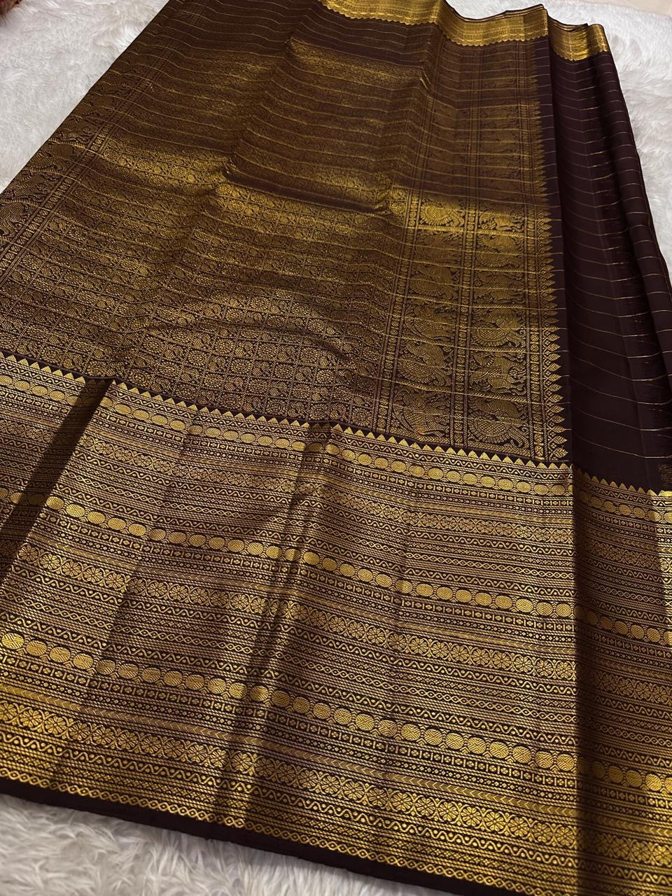 Brown Zari kattam with ornate border pure silk Kanchipuram with mayil chakram zari butta and detailed Pallu