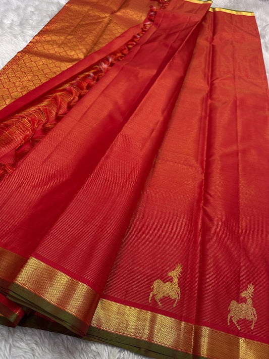 Red Glimmering Deer Vairaoosi — Pure Silk Kanchipuram Saree
Kumkum red vairaoosi with antique-gold deer buttas & kaddi zari border.
Silk Mark Certified · Free USA Shipping · Ships in 2 Weeks ✨