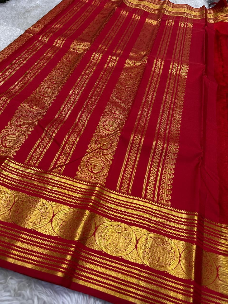 Vermilion Podi Kattam 🌺 Pure Silk Kanchipuram Saree
All-over zari pinstripes & mini podi kattam checks ✨
Broad antique-gold borders with chakram medallions 🪙
Silk Mark Certified ✅ | F