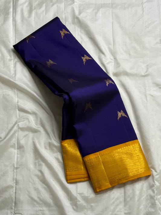 Iru Pakshi Purple — Pure Silk Kanchipuram Saree
Royal Purple with Twin-Bird Zari Buttas & Marigold Mustard Korvai Borders ✨
Silk Mark Certified ✅ | Ships in Two Weeks | Free Shipping within 🇺🇸