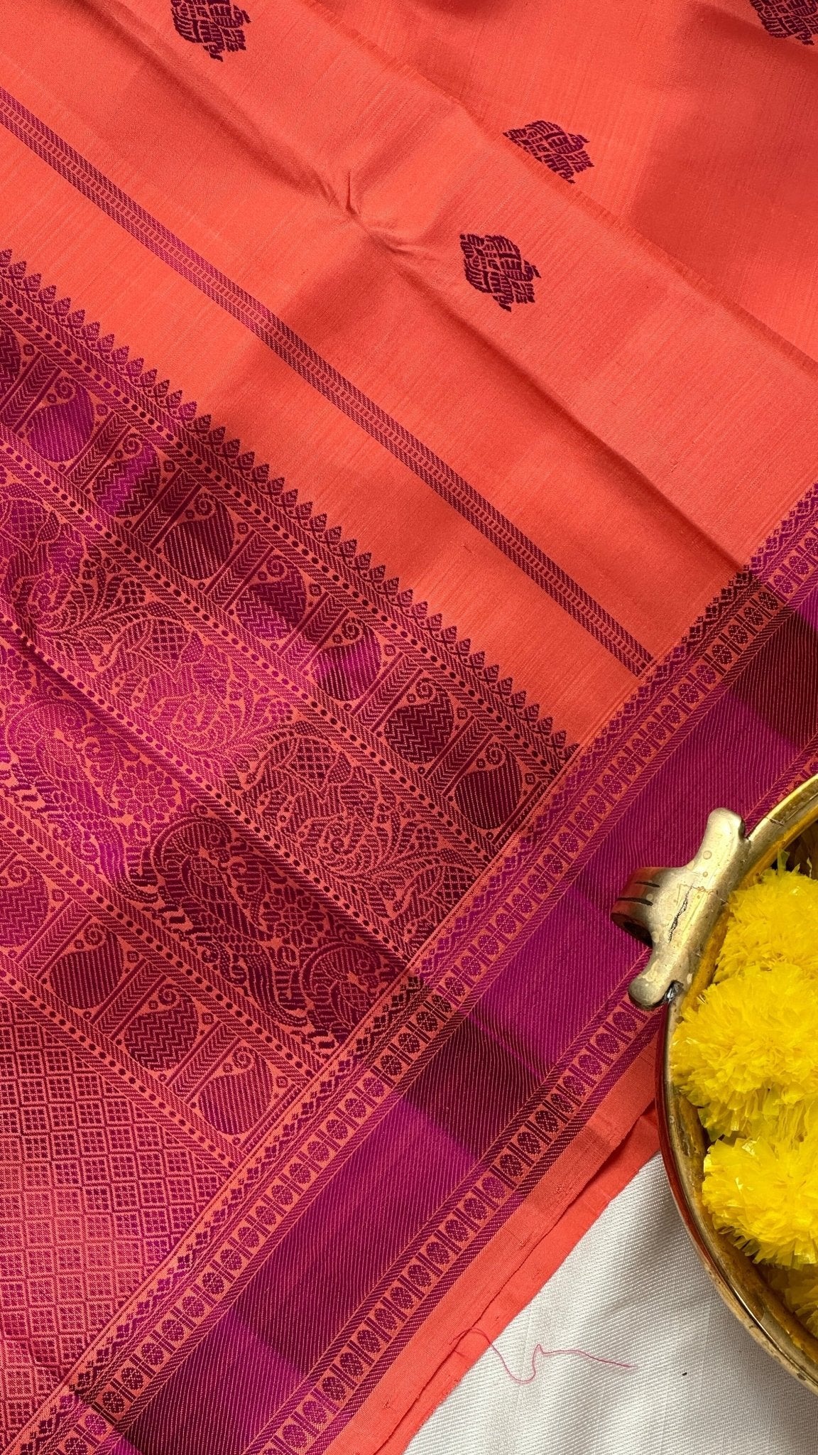 Peach pure Kanchipuram silk saree with purple silk thread weaving and no-zari thazhampoo border